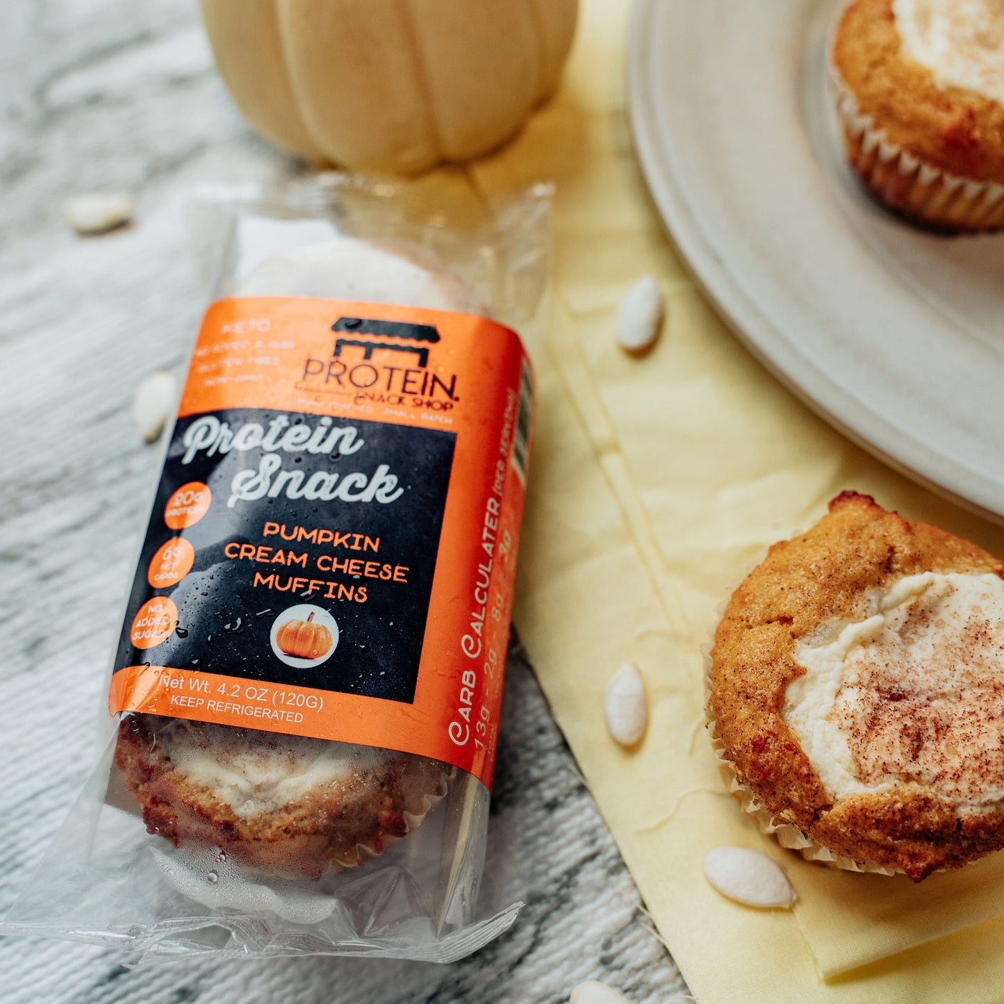 Keto Protein Pumpkin Cream Cheese Muffins