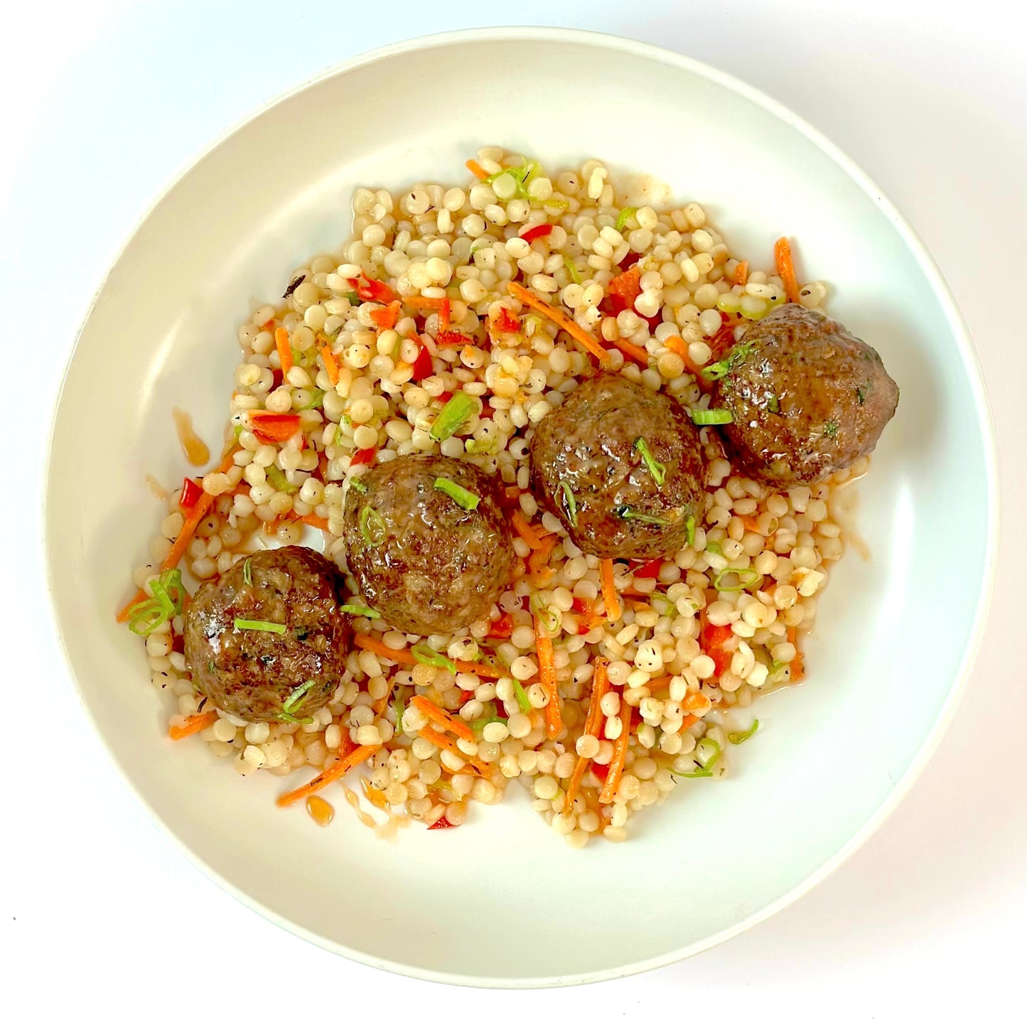 Honey Sriracha Meatballs with Israeli Couscous